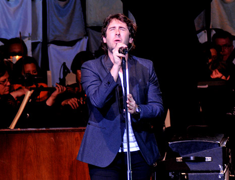 Man singing on stage 